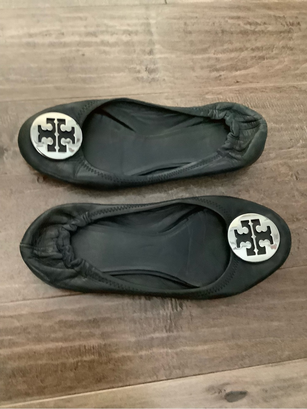 Tory Burch Black Leather Logo Ballet Flats with Silver Medallions